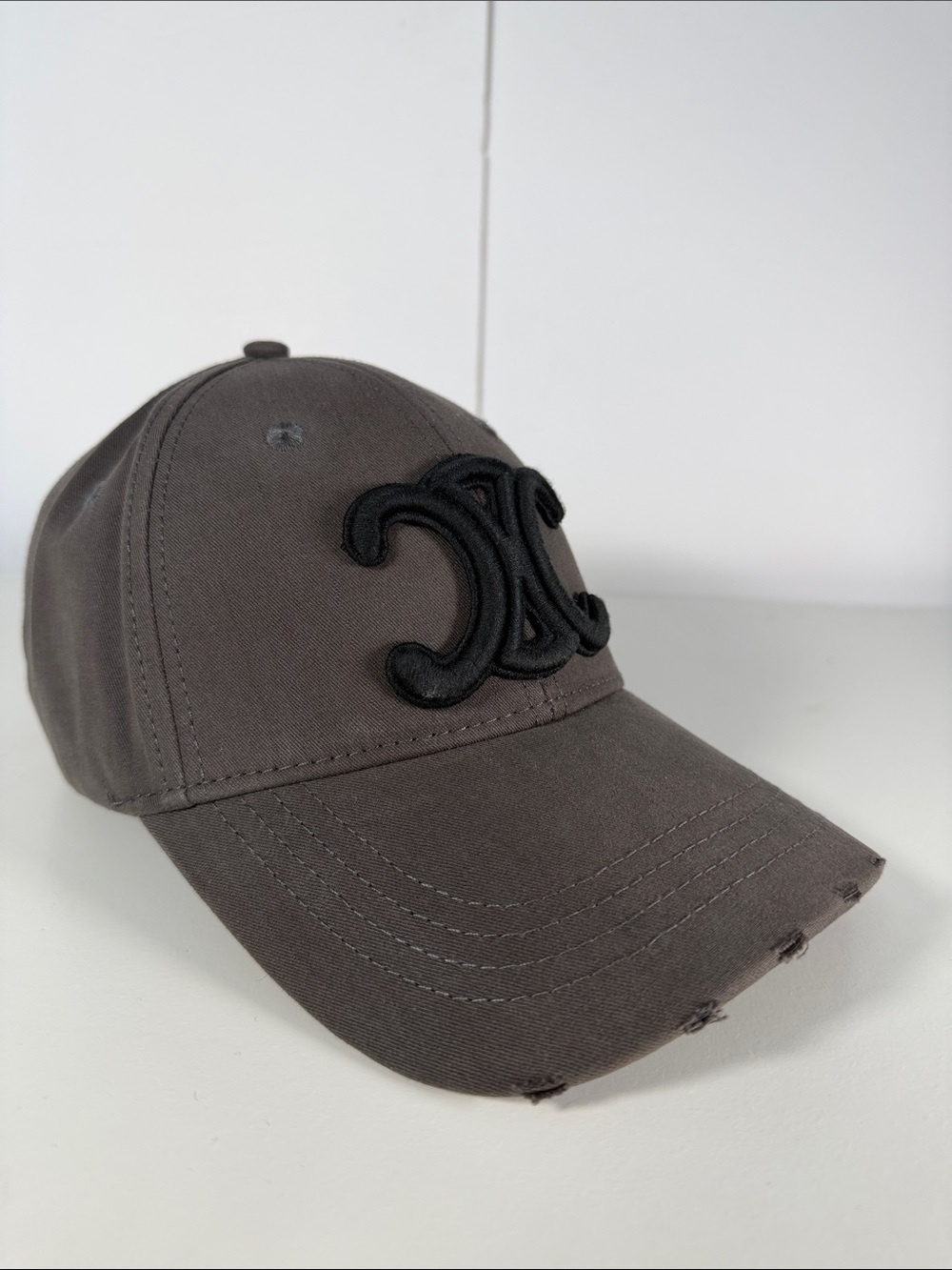 Distressed Grey Baseball Cap with Black Emblem